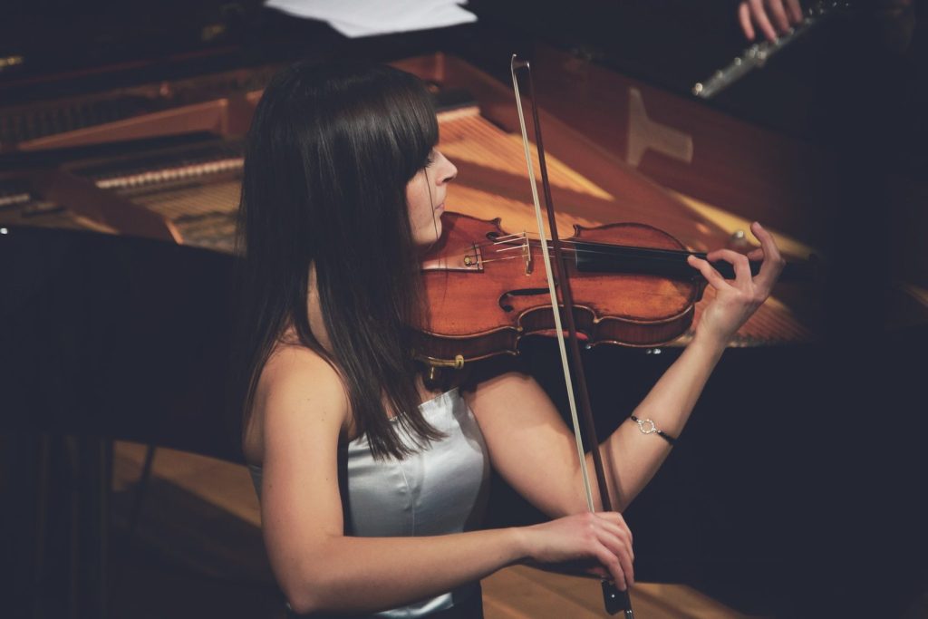 Charting Russia's Future: National Goals for 2030 and 2036 3 Woman playing the violin